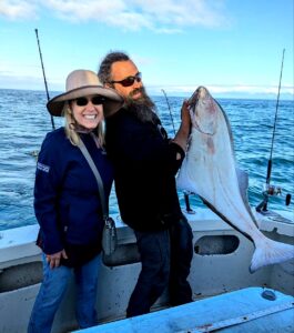 The captain and I showing off my halibut!
